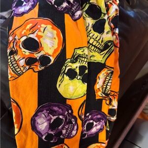 LuLaRoe Orange and Black Skull Leggings